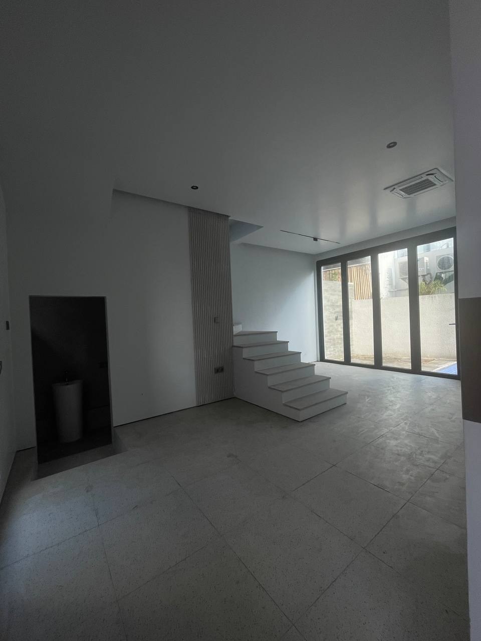 Aquamarine townhouse before renovation photo