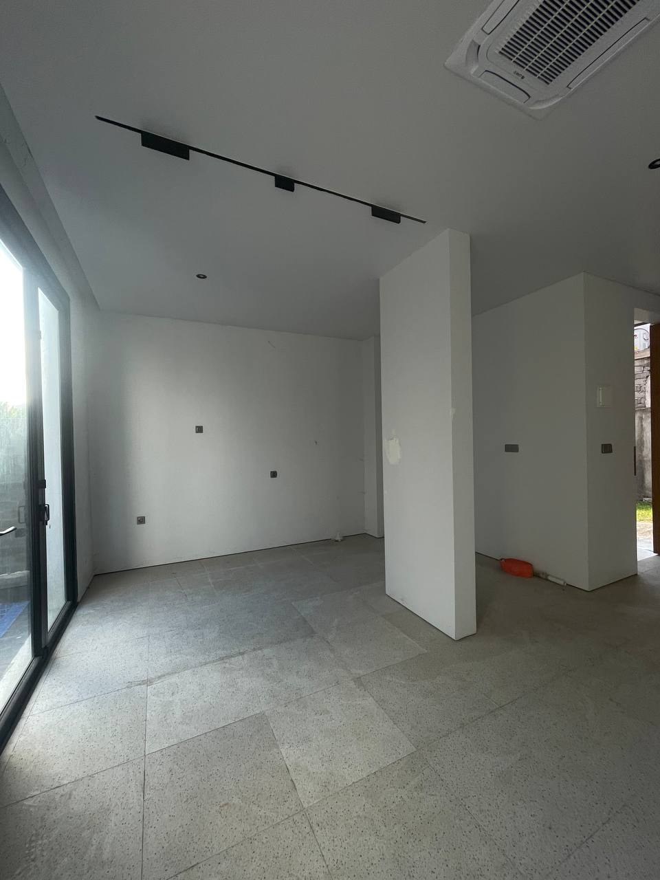 Aquamarine townhouse before renovation photo
