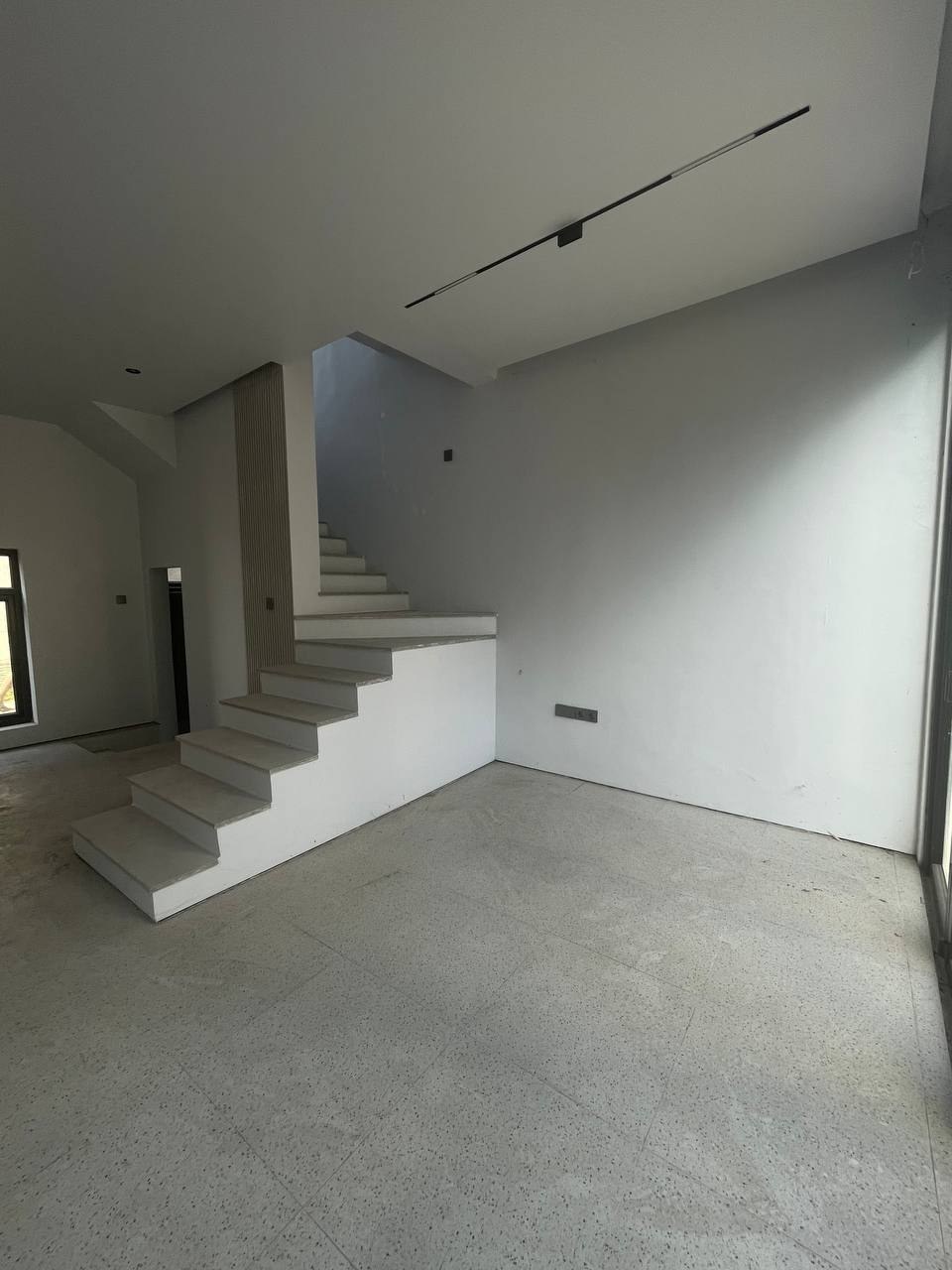 Aquamarine townhouse before renovation photo