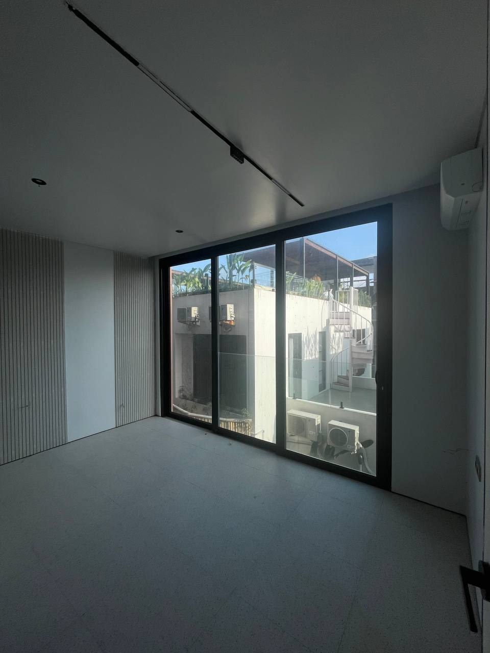 Aquamarine townhouse before renovation photo